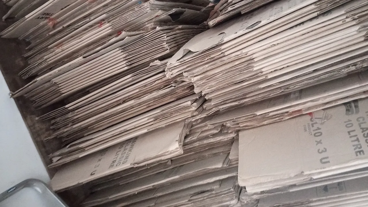 A stack of flat cardboard boxes